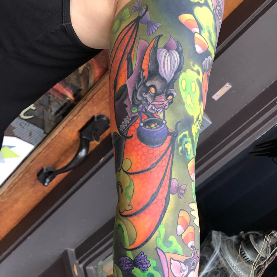 Bat and potion new school tattoo on the forearm by Erin Chance