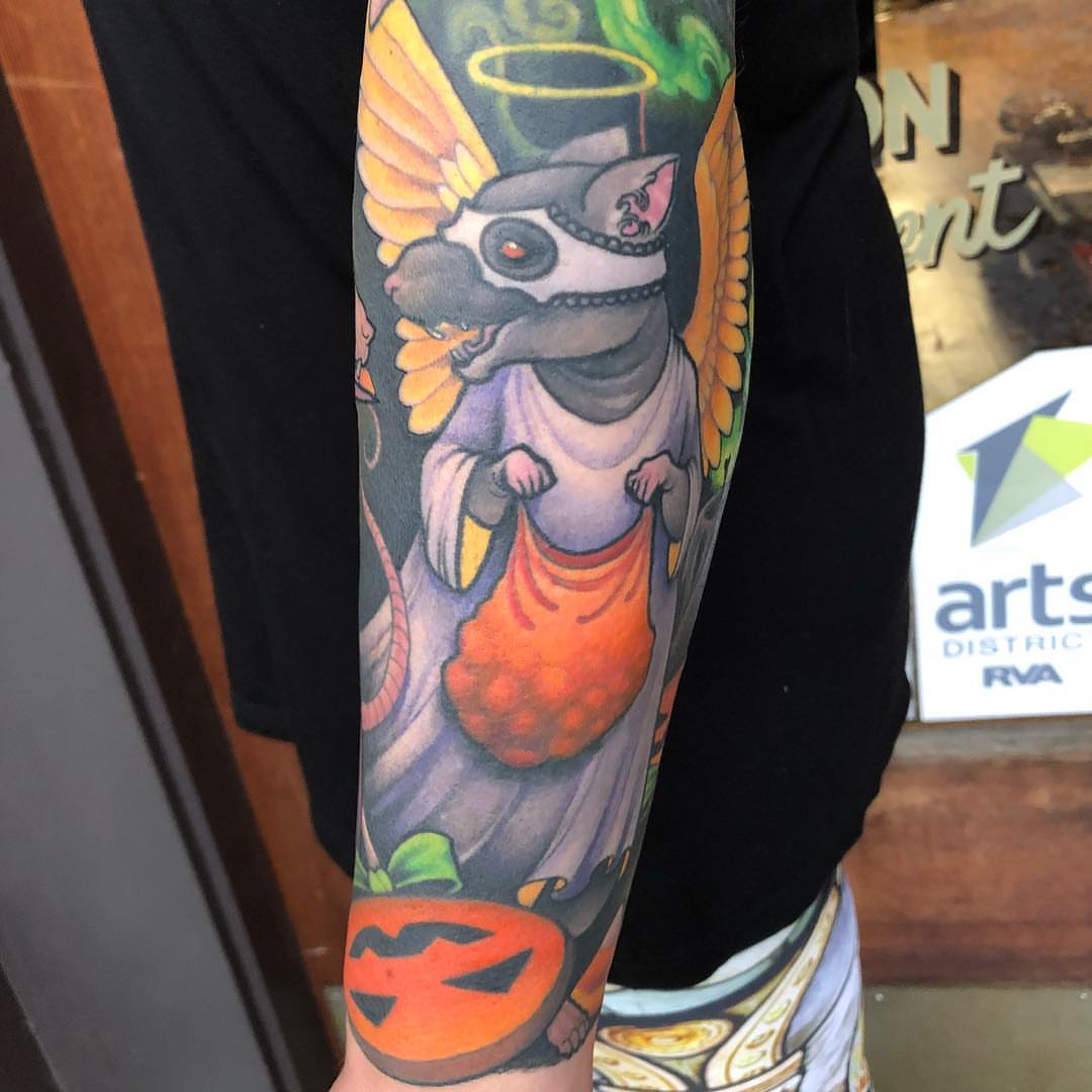 Cat angel new school tattoo on the forearm by Erin Chance