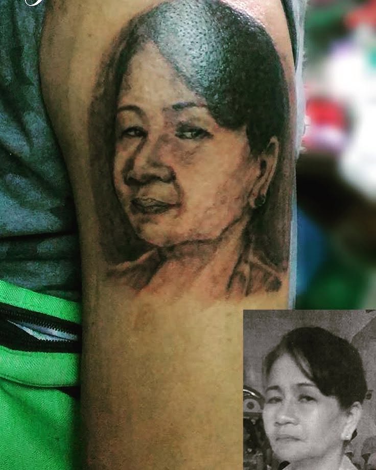 Portrait realism tattoo on the forearm by Ferds Villanueva