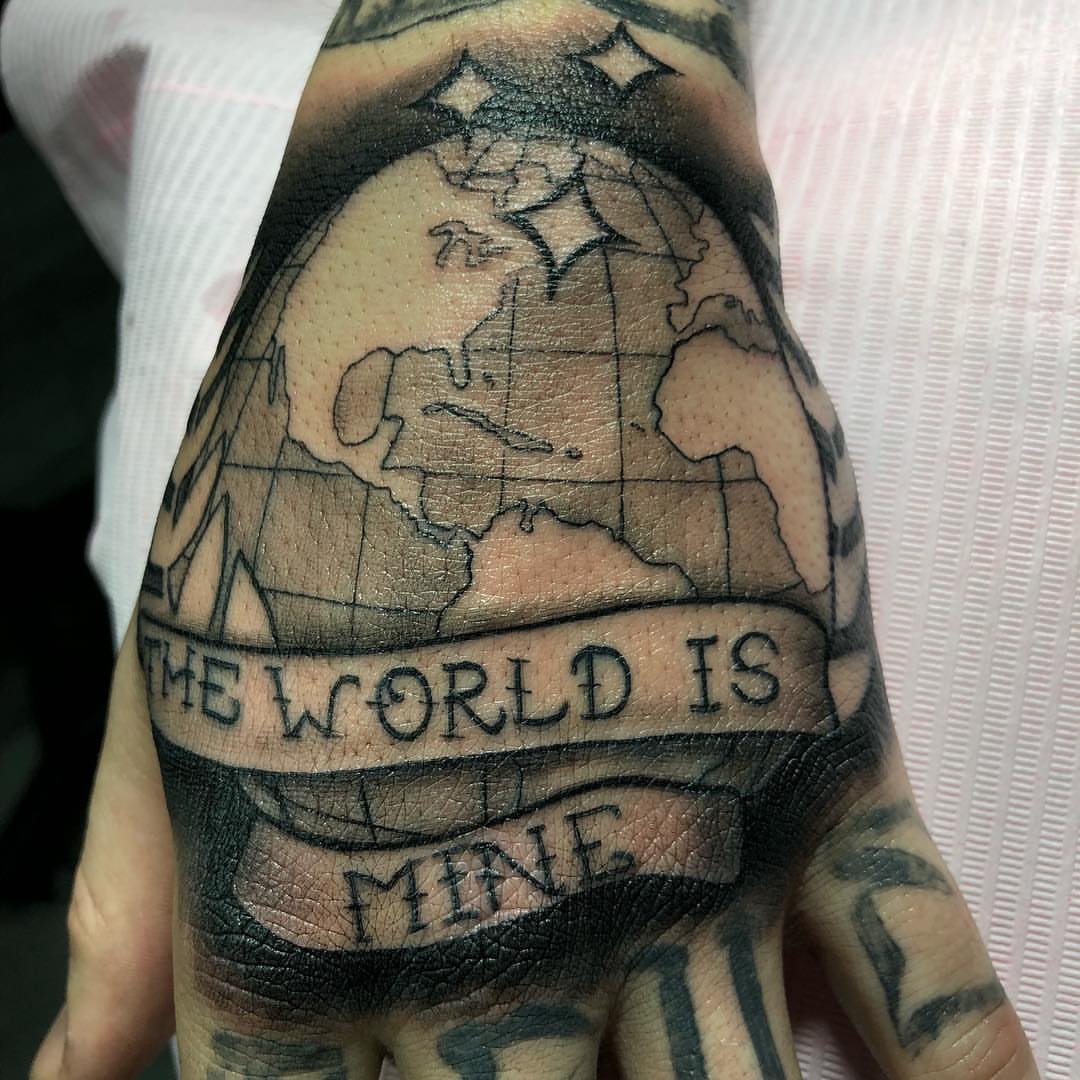 World map black and grey tattoo on the hand by ✧ Maria ✧