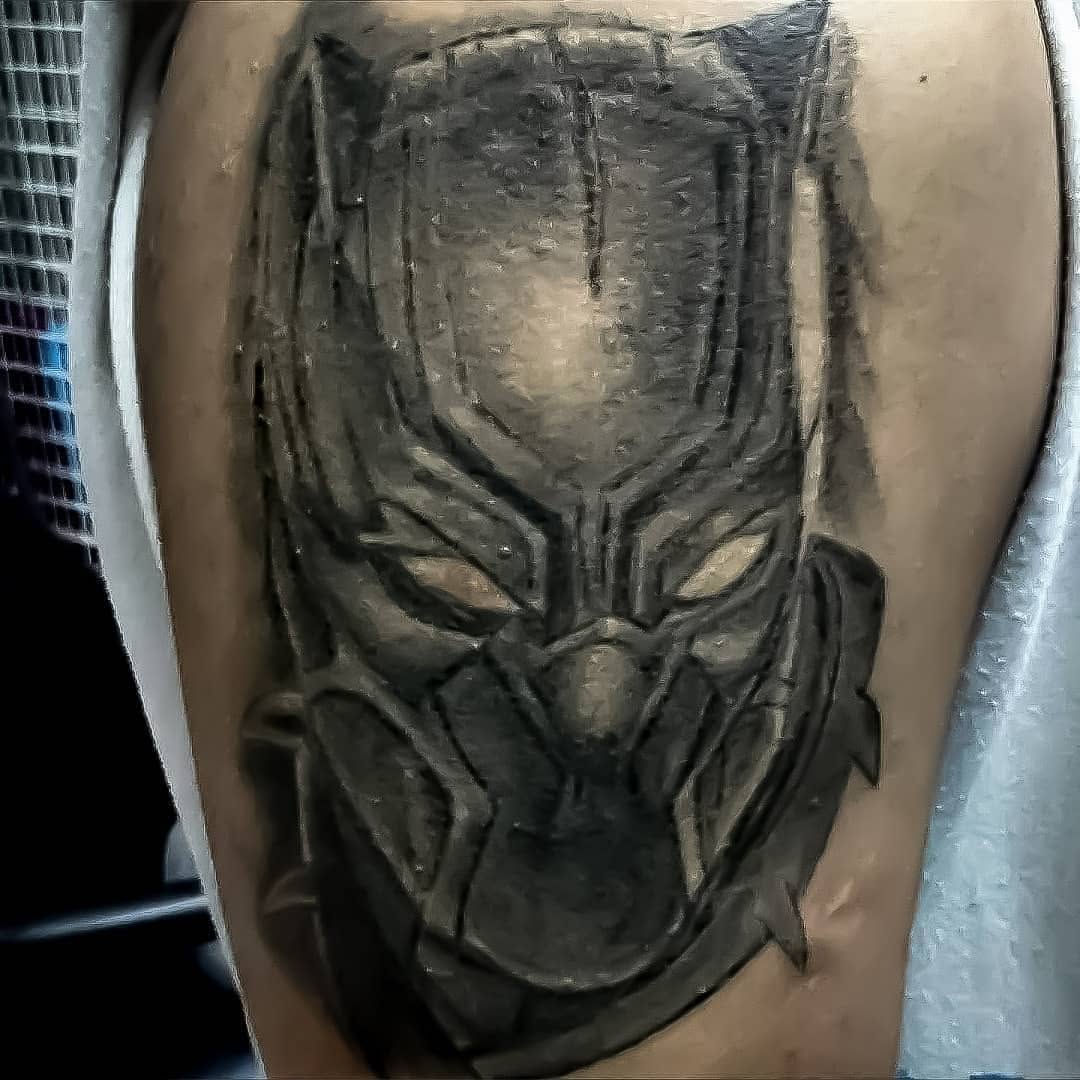 Black Panther mask realism tattoo on the forearm by 212tattoomalaga, Málaga, Spain