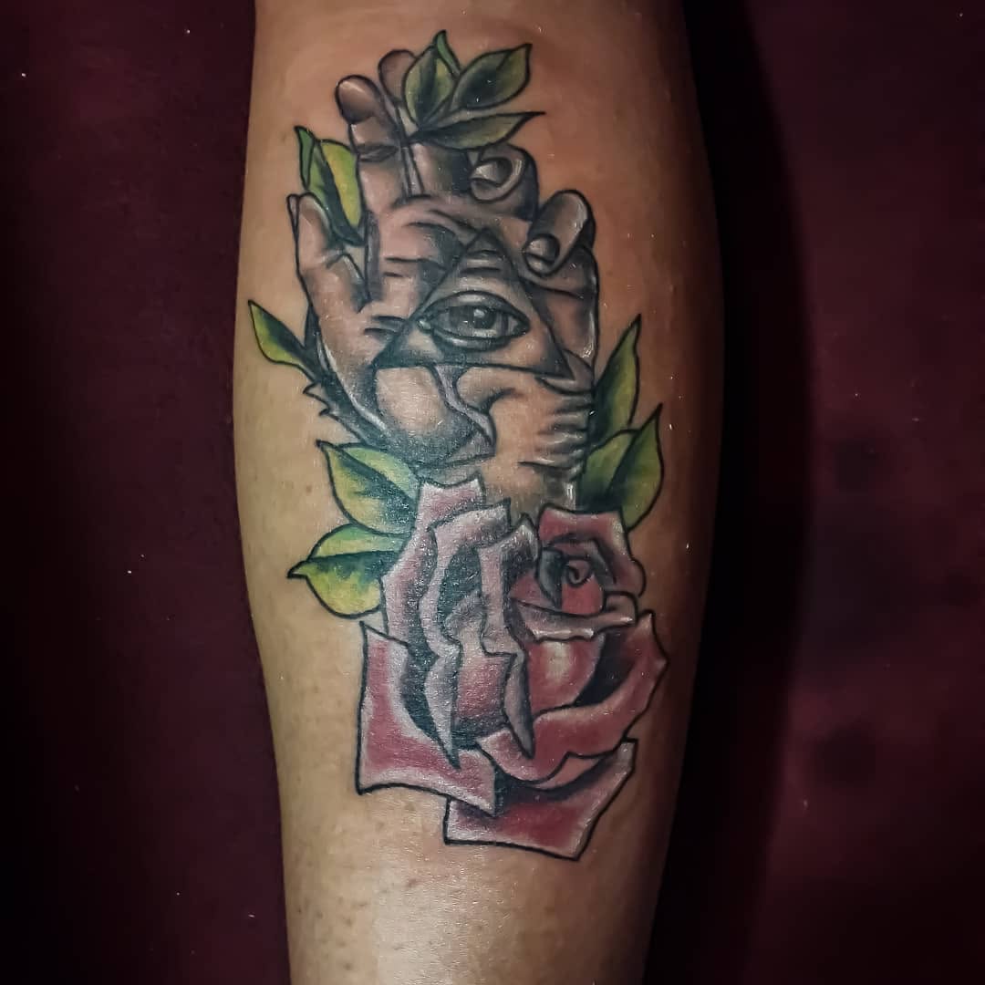 Hand with eye and rose dark art tattoo on the forearm by 212tattoomalaga, Málaga, Spain
