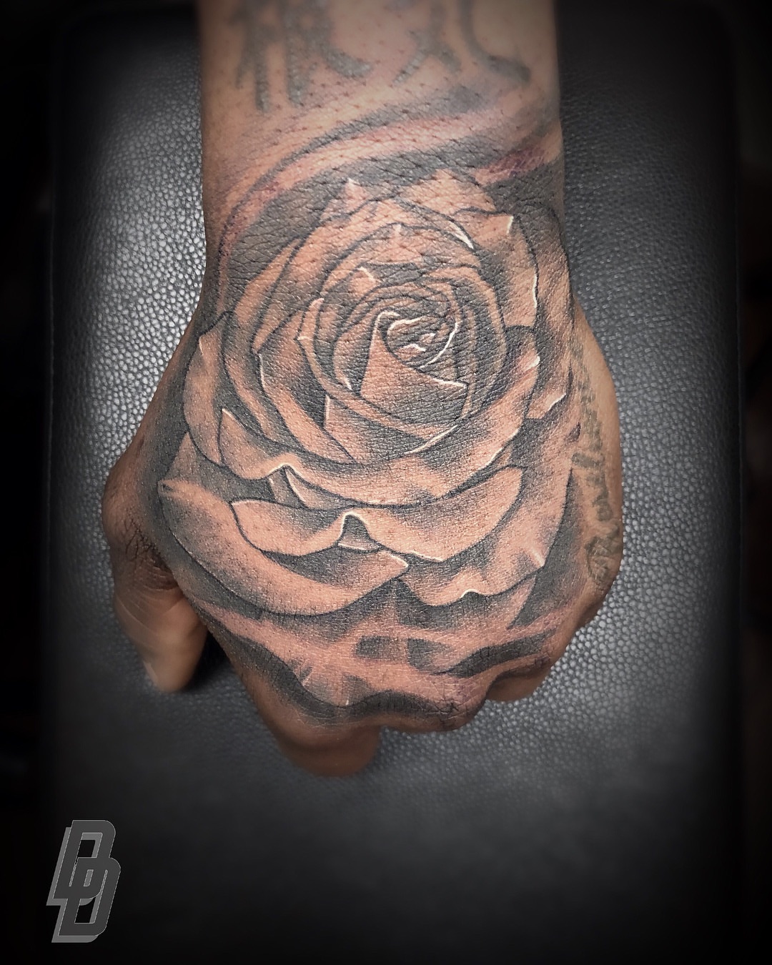 Rose black and grey tattoo on the hand by DJ ๐จ๐พโ๐จ
