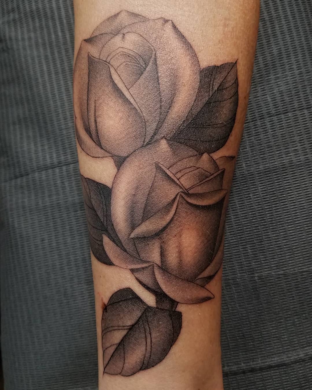 Rose realism tattoo on the forearm by @jaclyngreb