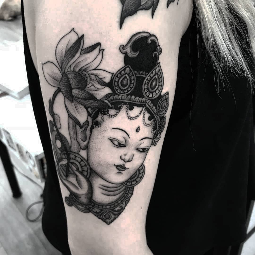 Tattoo by @blackbird_okinawa — black_and_grey, realism