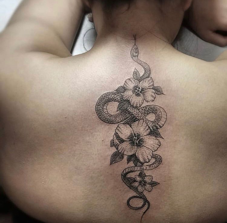 Snake and flowers realism tattoo on the back by Felix 🔸 Chesto (Tattooers)