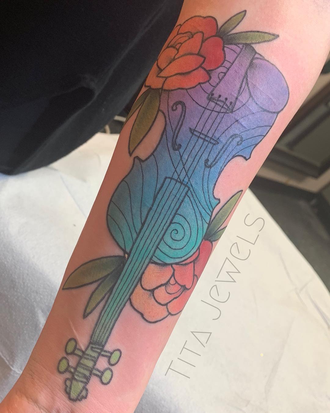Violin and rose American traditional tattoo on the forearm by Tita Jewels- Tattoo Artist, Austin, Texas