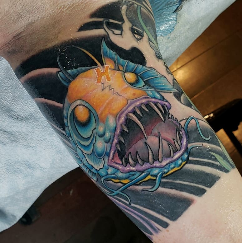 Angler fish dark realism tattoo on the forearm by Jake Goss, Salt Lake City, Utah