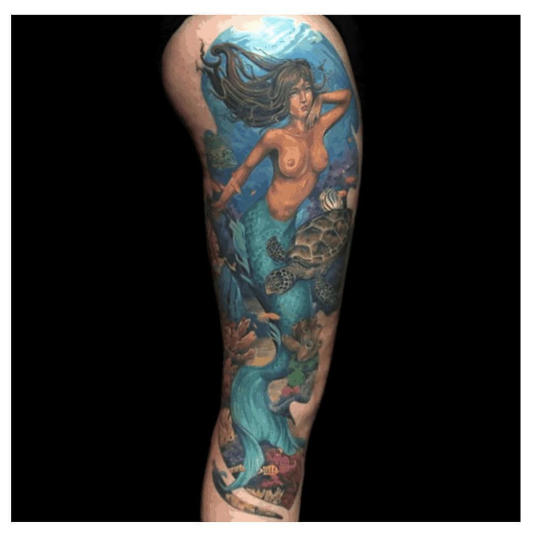 Mermaid realism tattoo on the forearm by Walter Frank