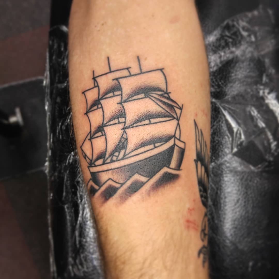 Sailboat black and grey tattoo on the forearm by CASEY JENSEN ✨ Fort Collins CO