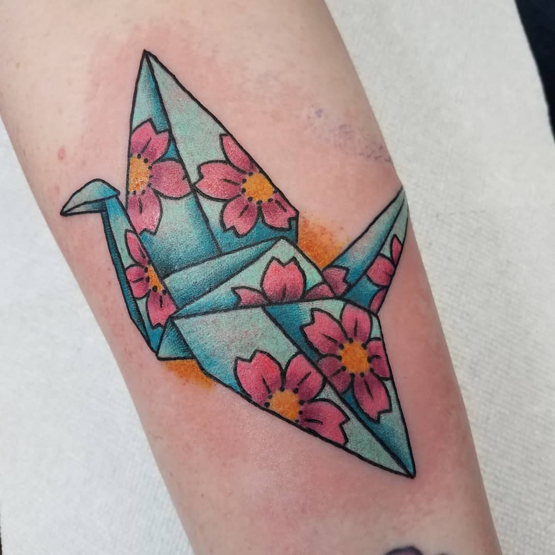 Origami crane geometric tattoo on the forearm by Ginny McCormick, Richmond, Virginia