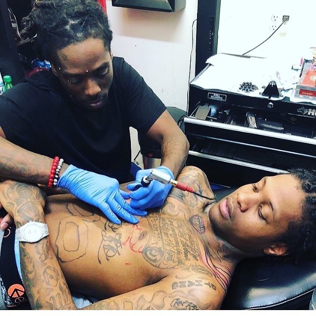 Script tattoos on chest and neck tattoo on the chest by Teddi James, Renton, Washington