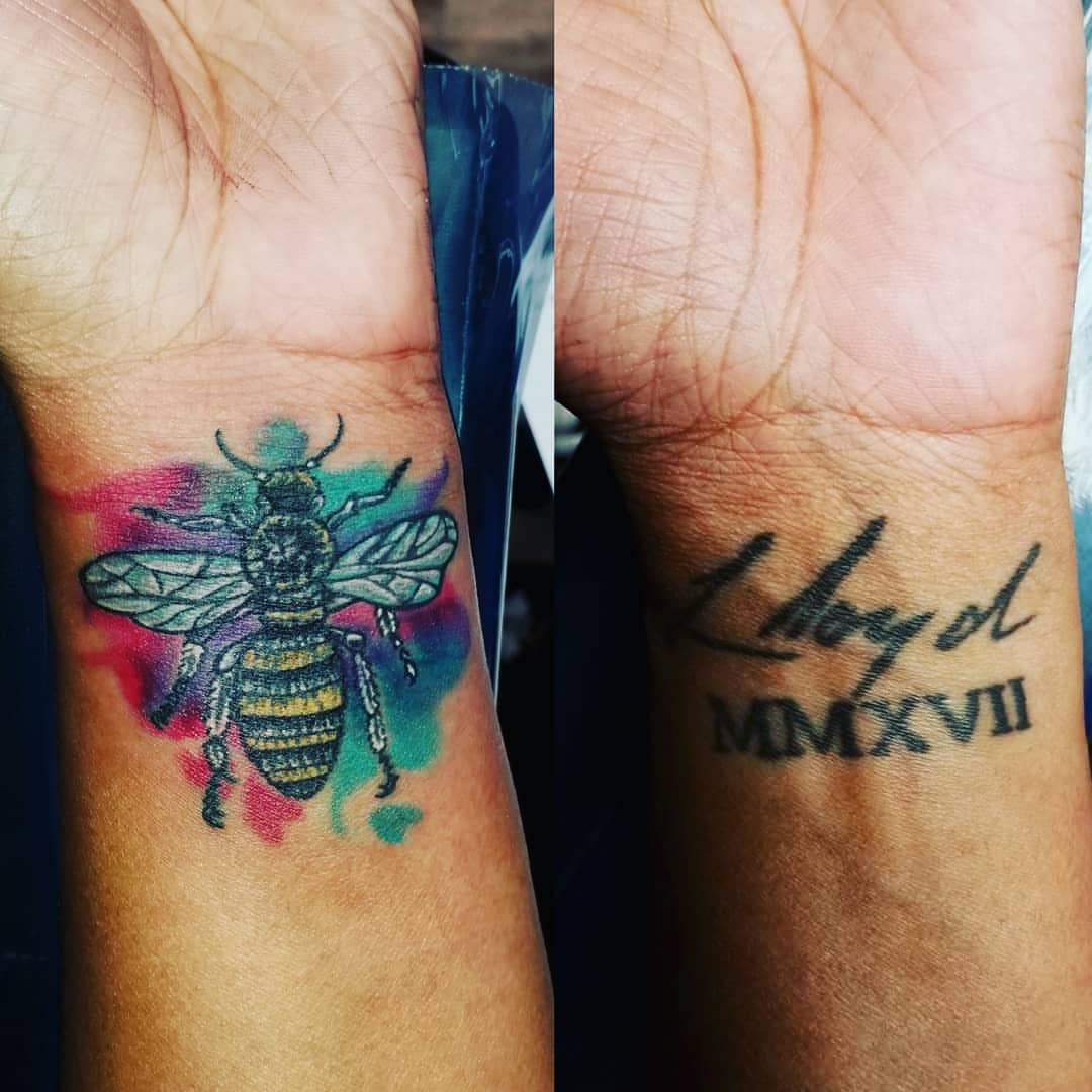 Bee watercolor tattoo on the forearm by André Brazil