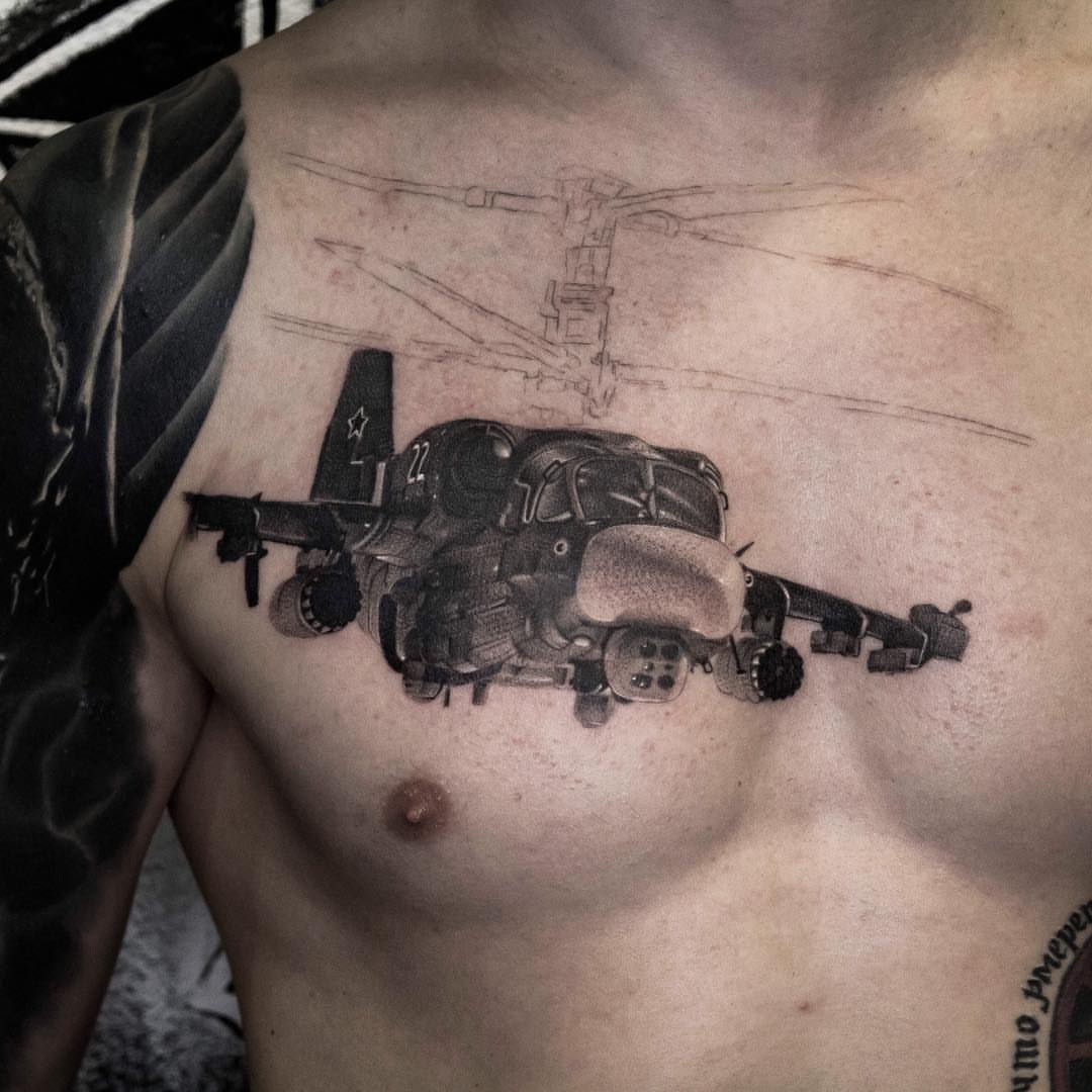 Helicopter black and grey tattoo on the chest by Nikita Grinenko, San Francisco