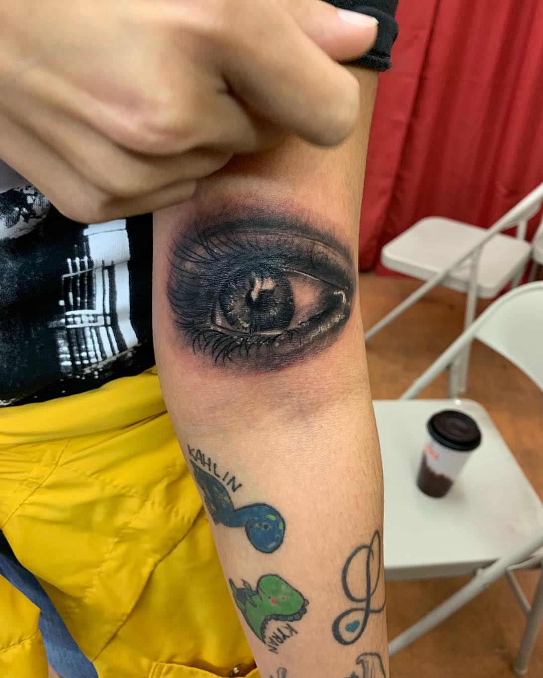 Eye realism tattoo on the forearm by Sly Davis