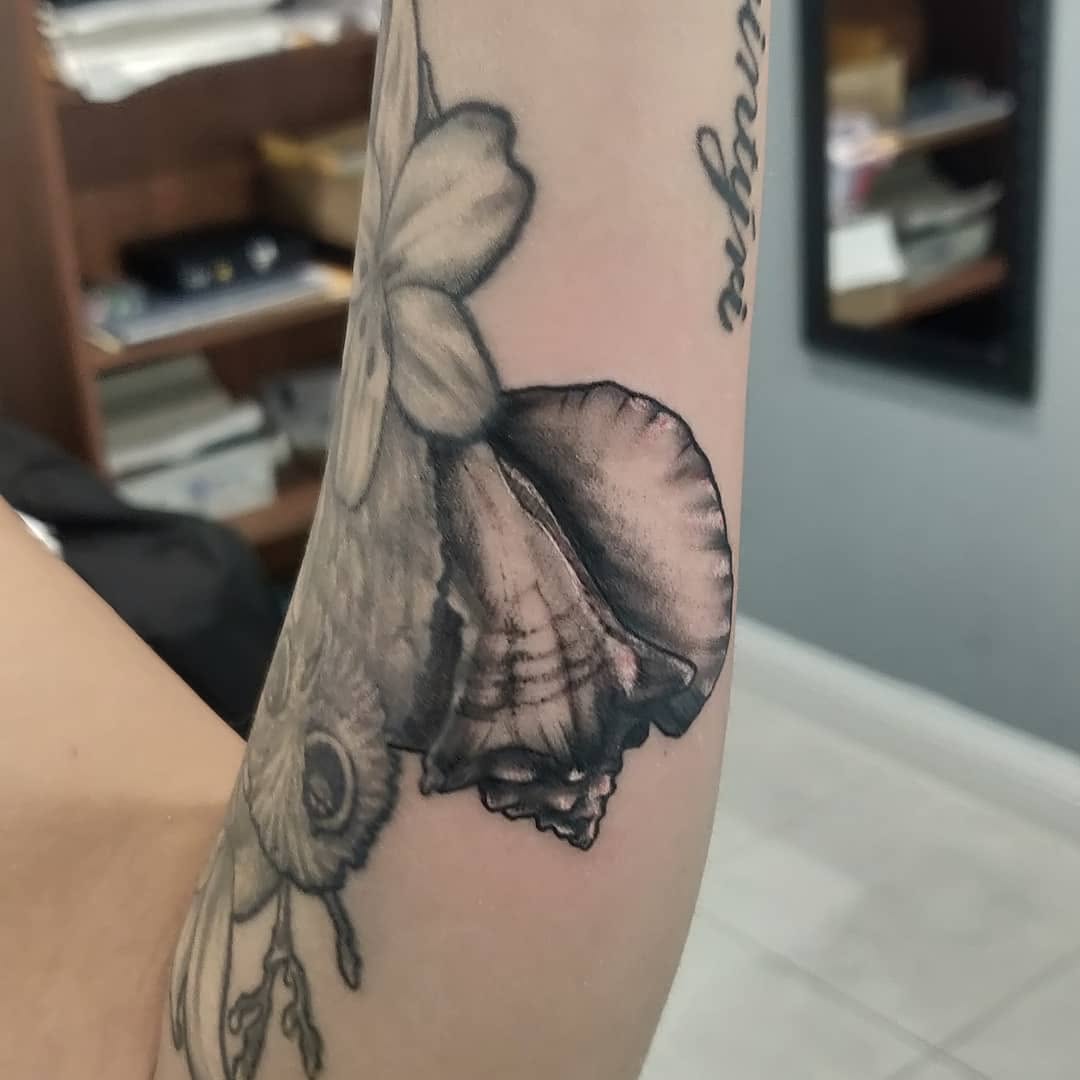 Tattoo by @jazihnotattoo — black_and_grey, realism