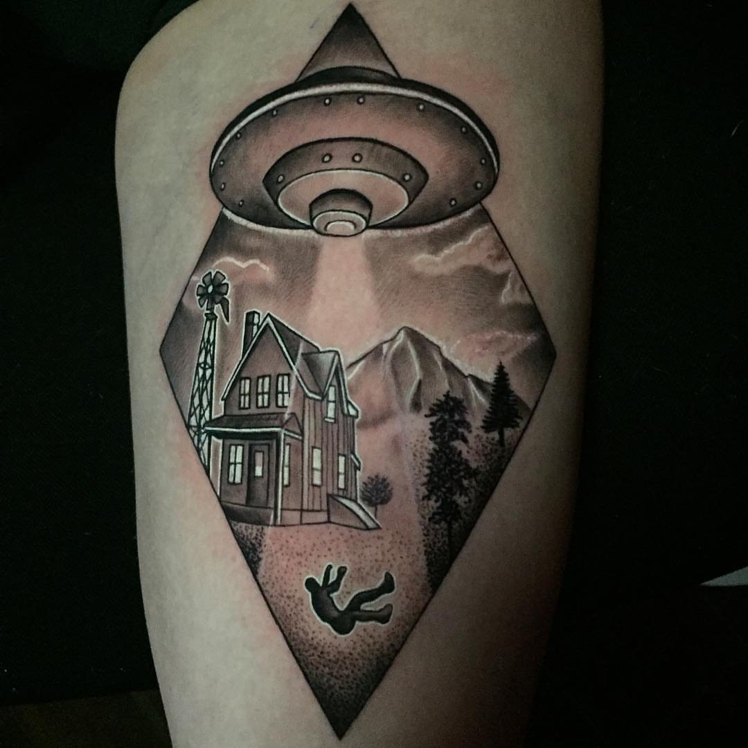 UFO abduction scene realism tattoo on the forearm by Joe Shepp