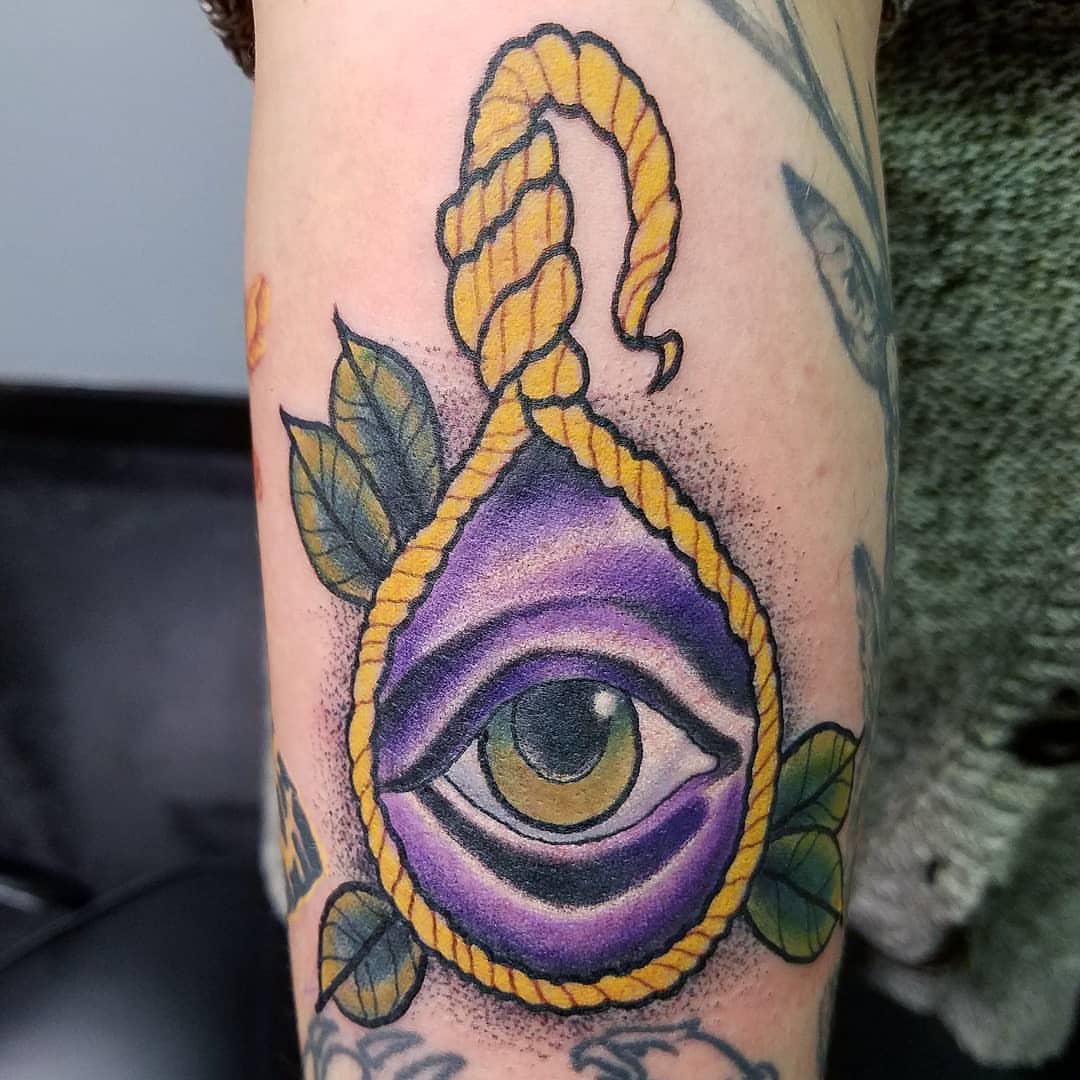 Eye with rope dotwork tattoo on the forearm by Dick Eckman