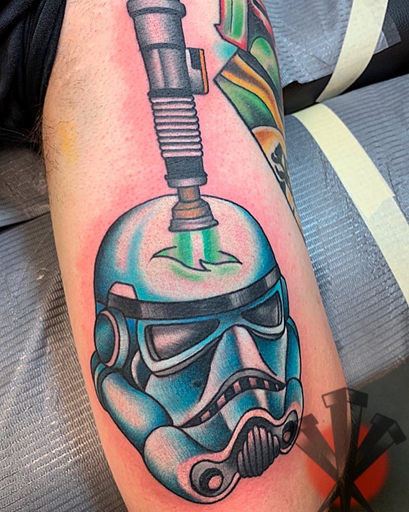 Stormtrooper helmet American traditional tattoo on the thigh by George Weibe