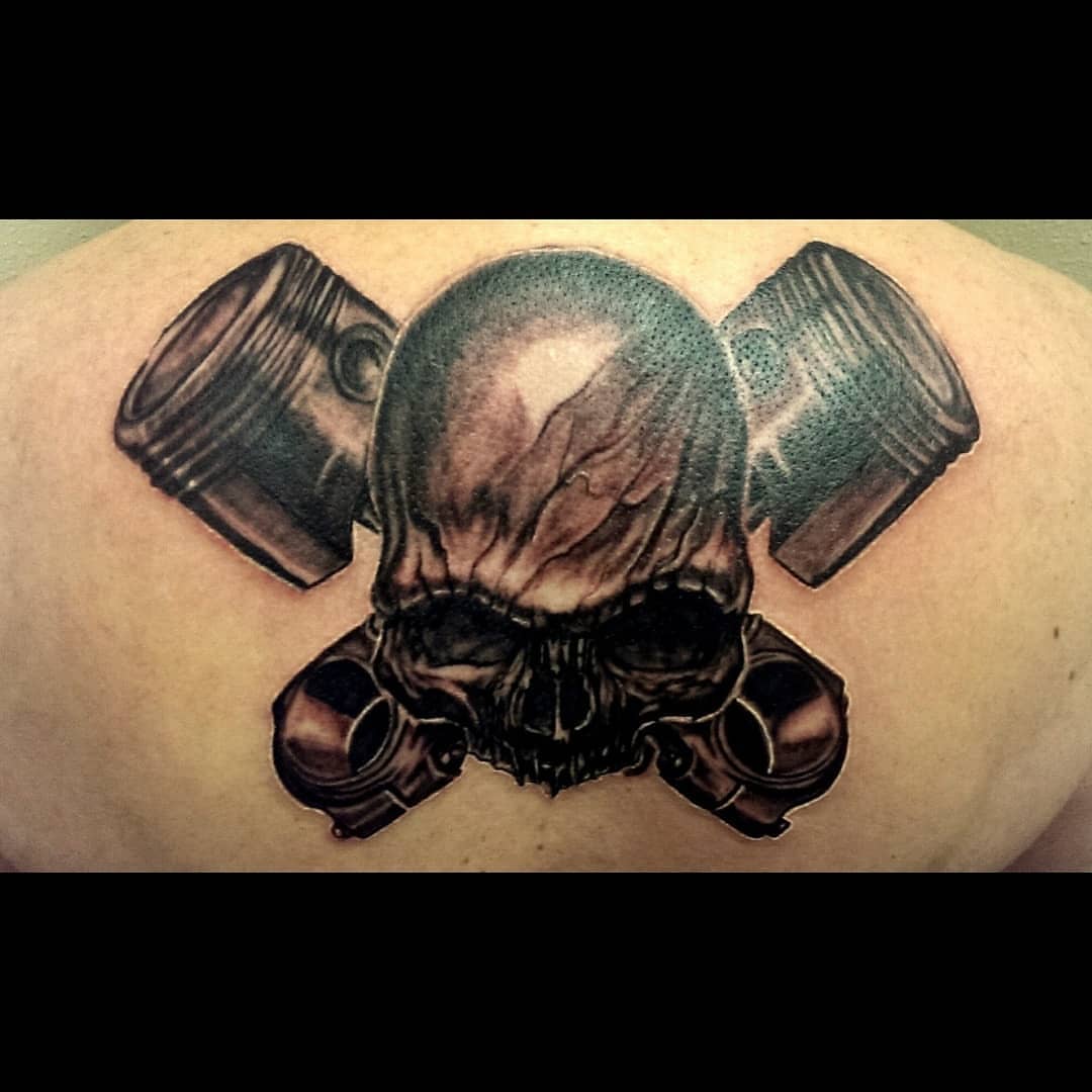 Skull with gas mask dark realism tattoo on the shoulder by Rue McLean