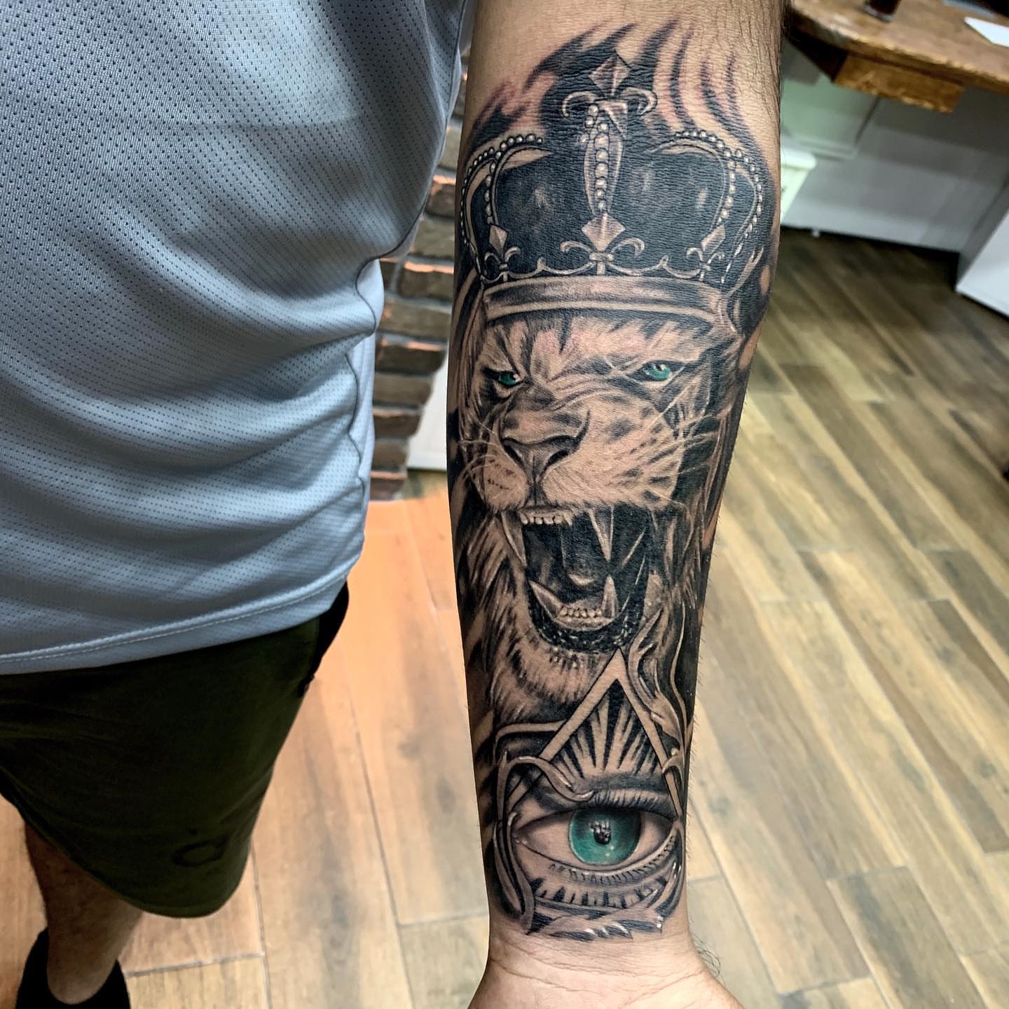 Tattoo by @ozzyblacklinetattoo — realism, black_and_grey
