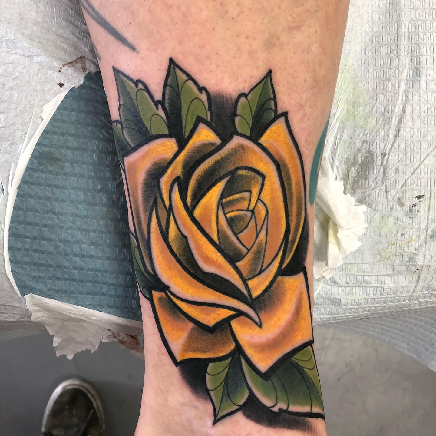Yellow rose American traditional tattoo on the forearm by Mark Johnson [Tattoo Artist]