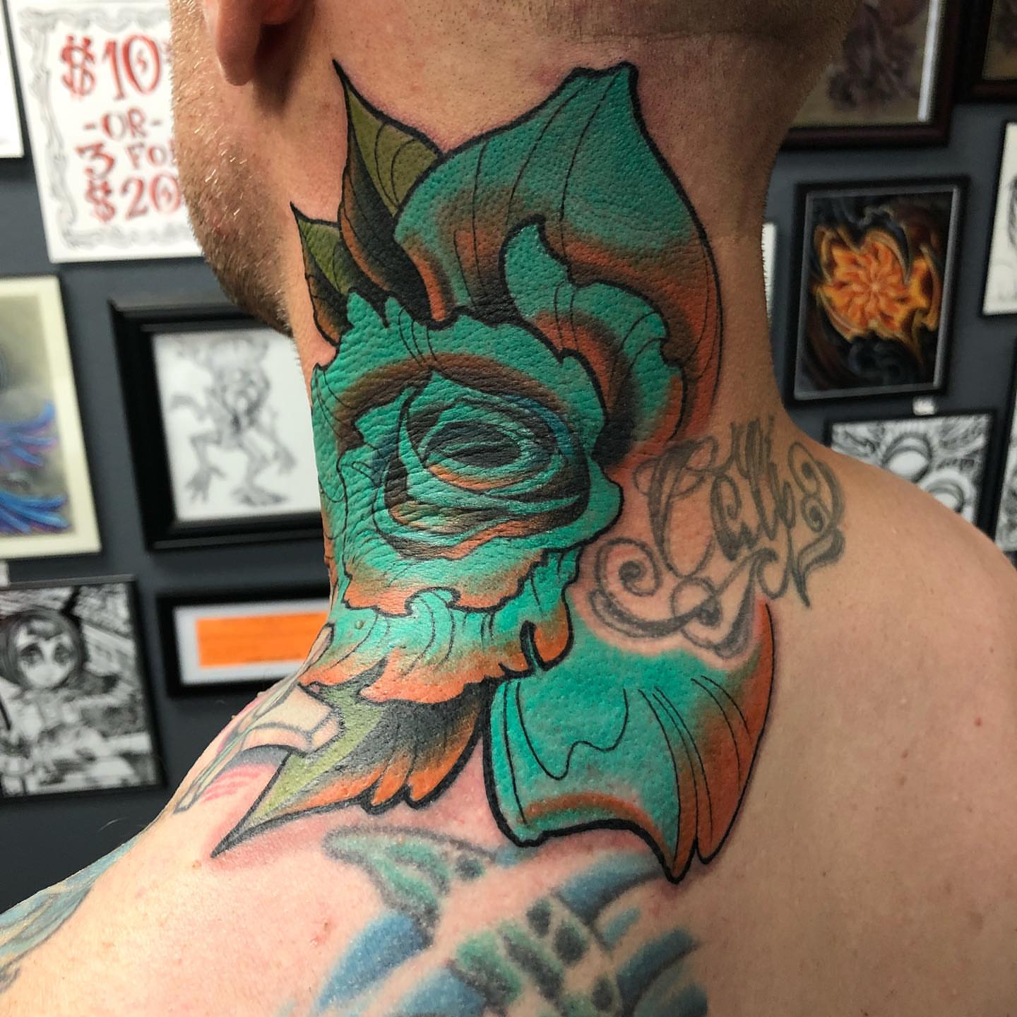 Floral new school tattoo on the neck by Mark Johnson [Tattoo Artist]