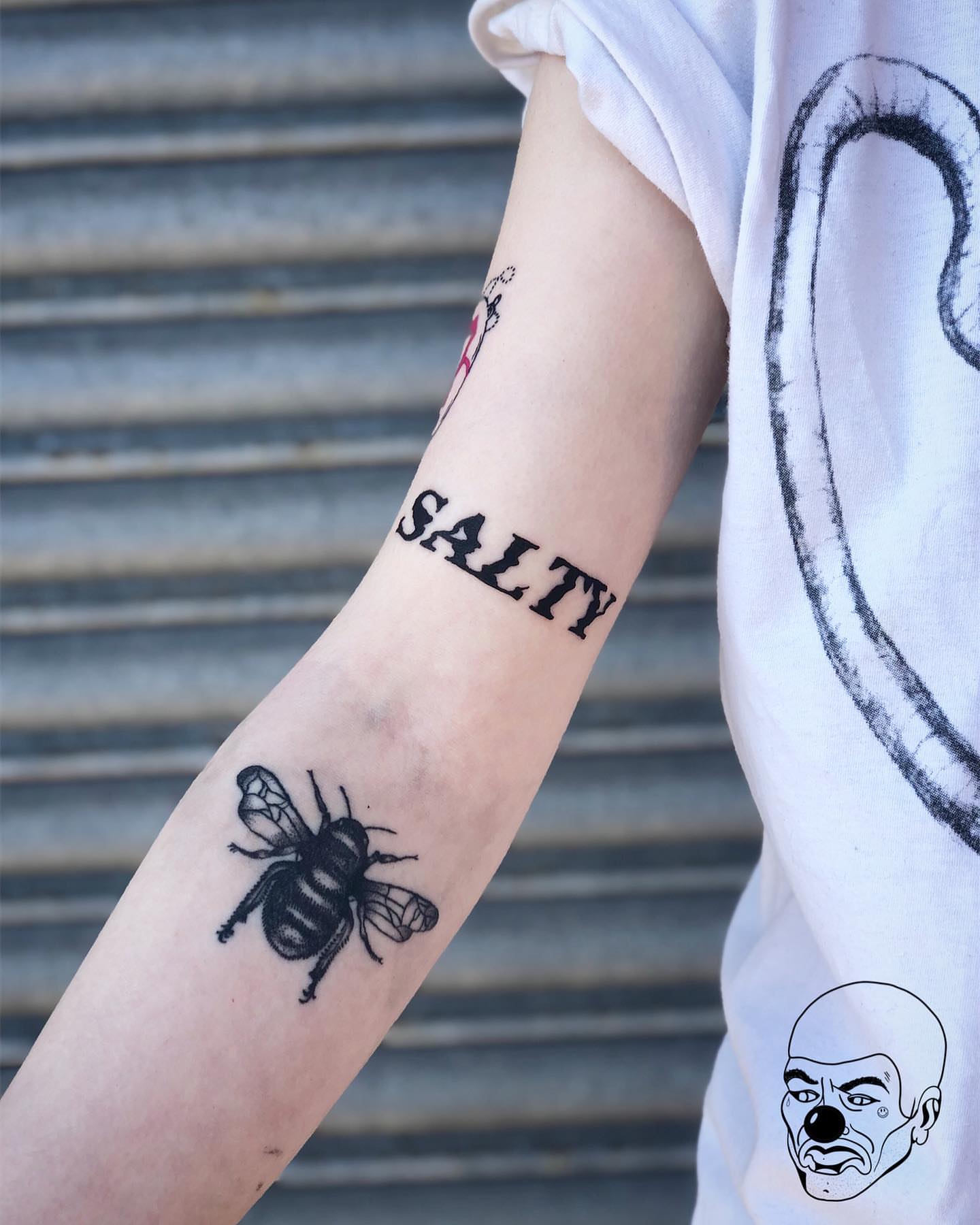 Bee black and grey tattoo on the forearm by πππ πππππππ