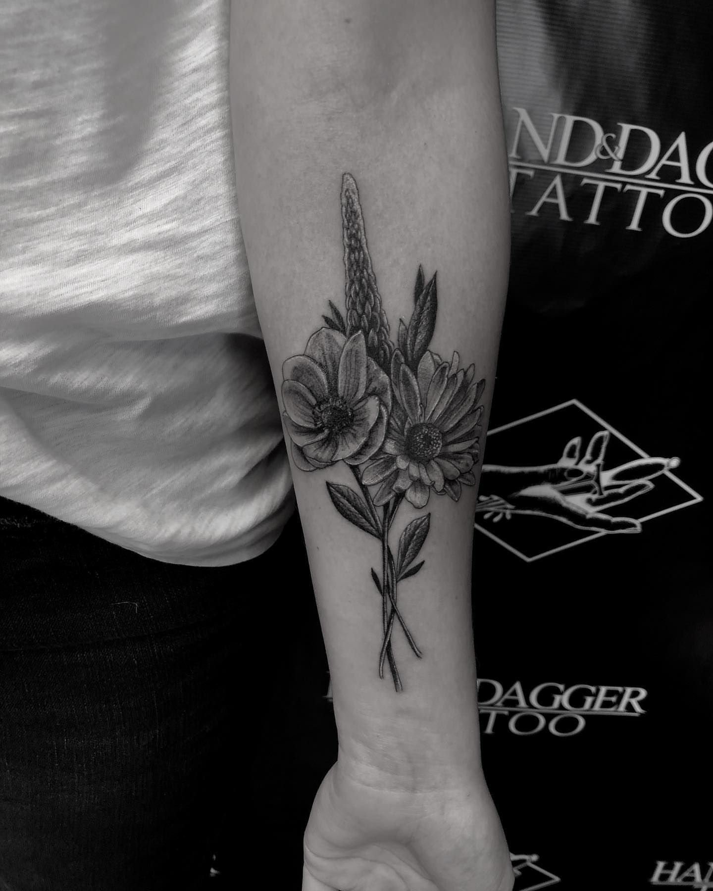 Flowers black and grey tattoo on the forearm by Kody Miller Tattoos 📍Kansas City MO Tattoo, Kansas City, Missouri