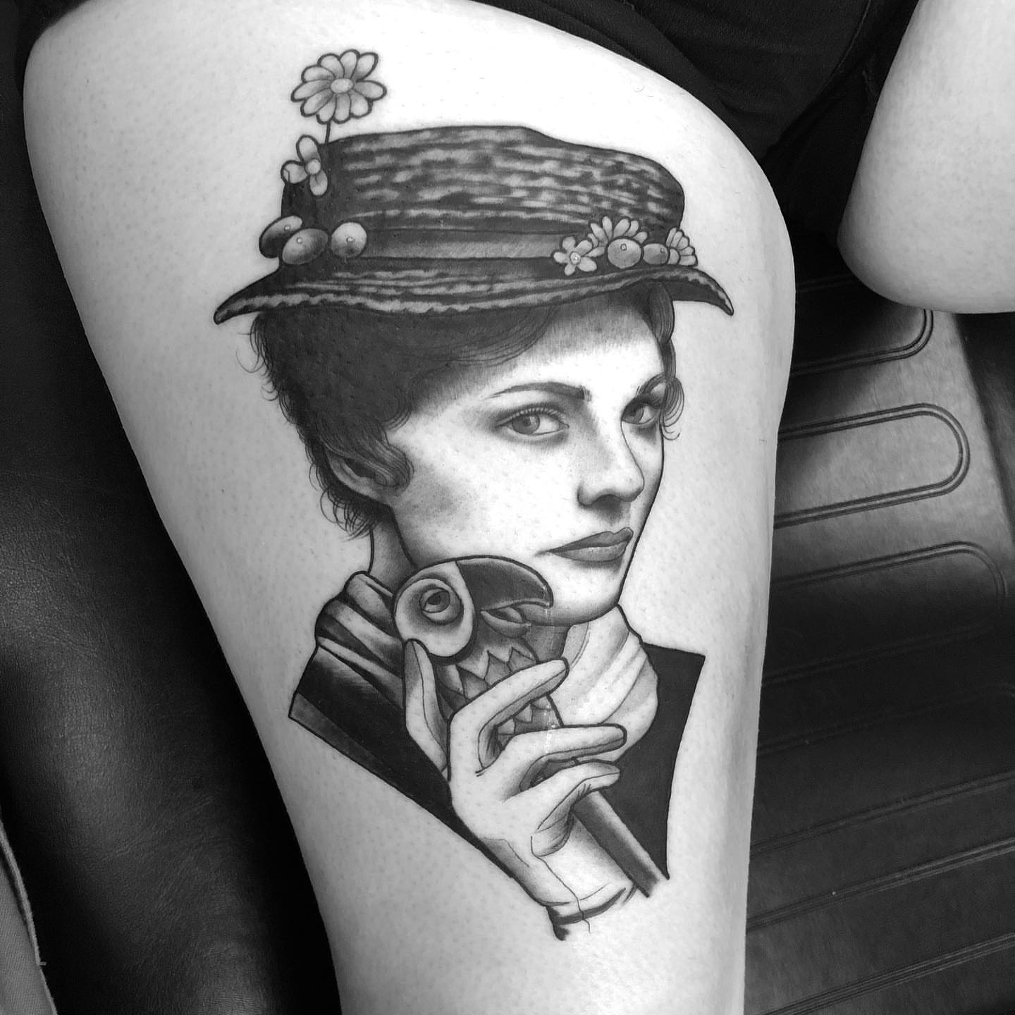 Portrait of a woman realism tattoo on the thigh by Sam Fortney, Columbus, Ohio