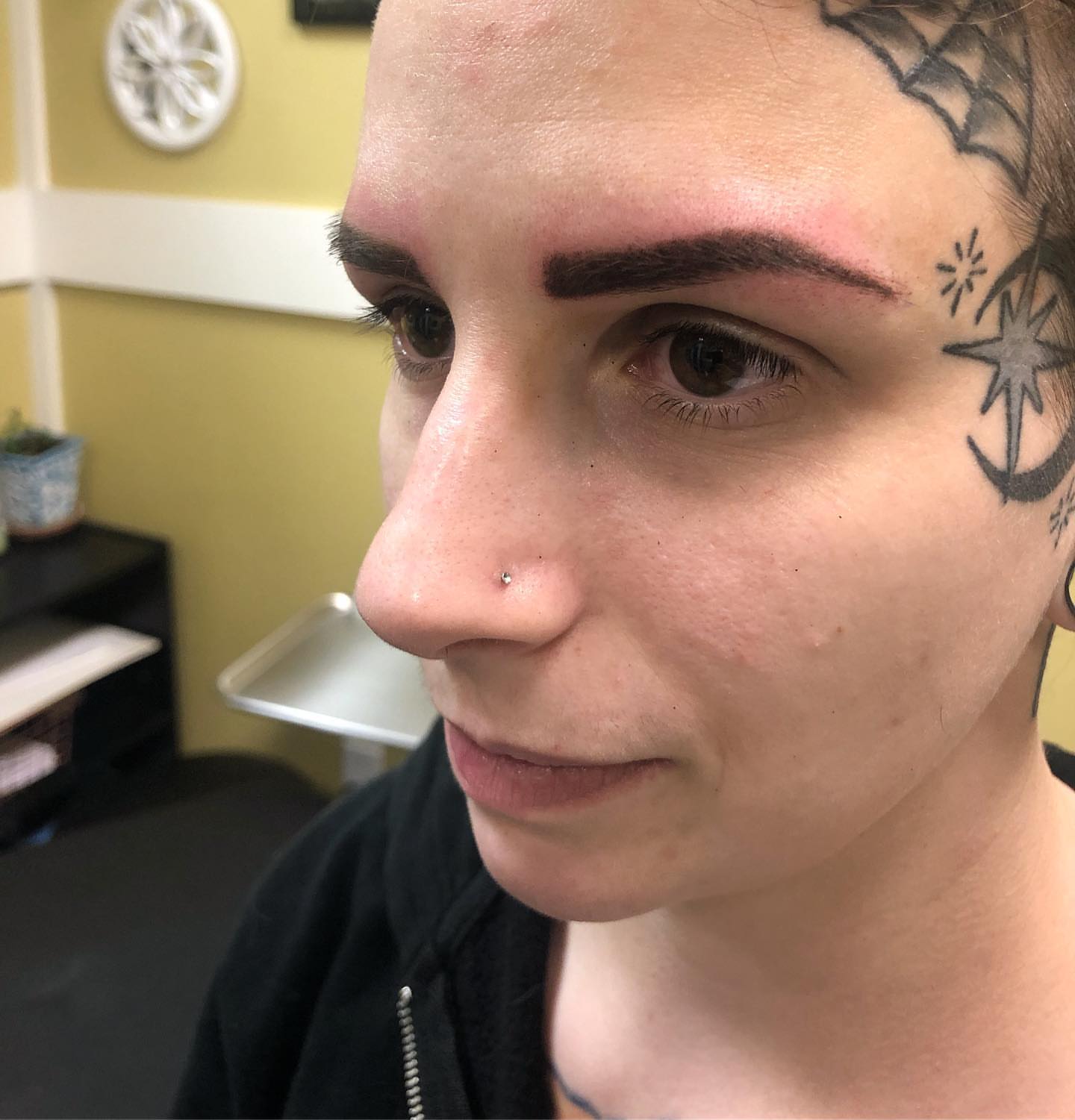 Anchor black and grey tattoo on the head by Sally Darling