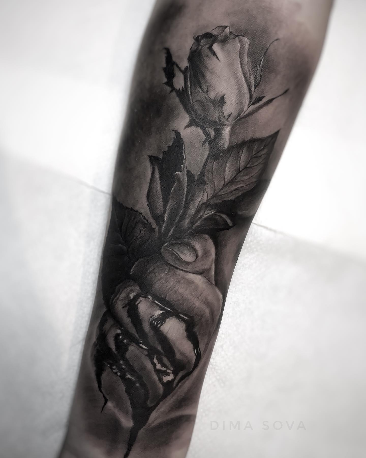 Rose and hands realism tattoo on the forearm by โ๏ธ Dima Sova โ๏ธ Tattoo ๐บ๐ธ Arlington VA