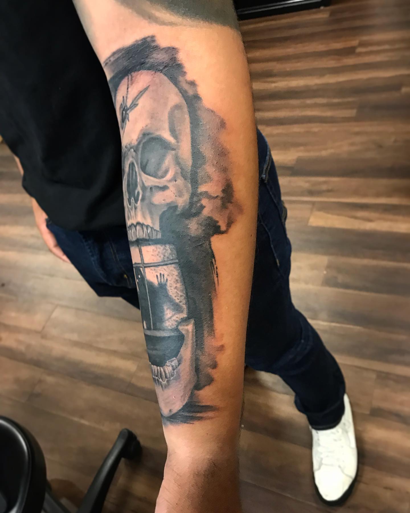 Skull realism tattoo on the forearm by Junior Nunez