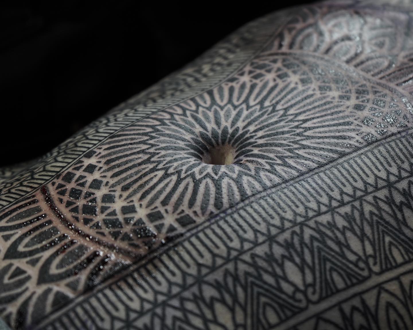 Geometric pattern geometric tattoo on the torso by Oliver kenton, San Diego, California