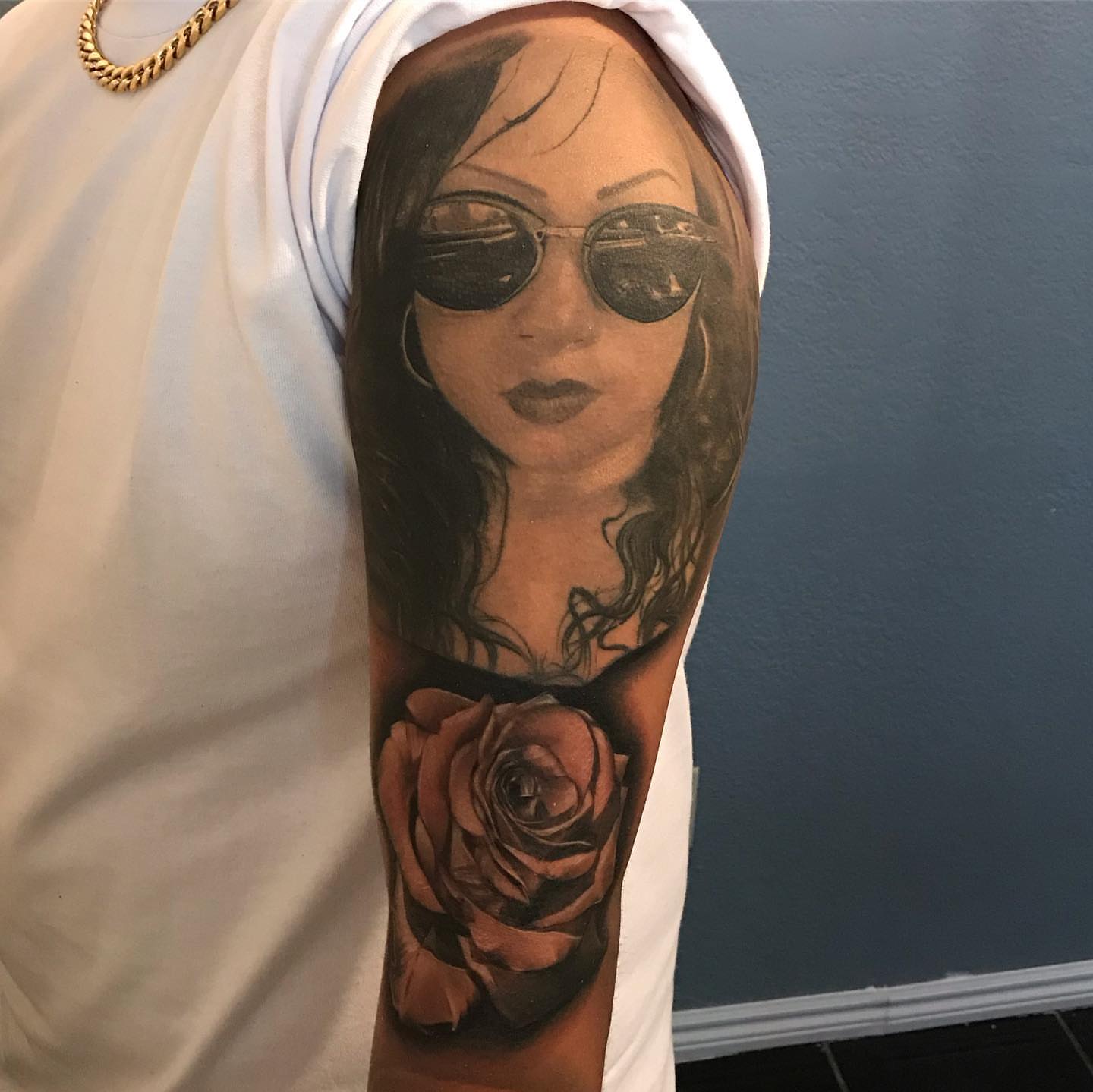 Portrait with rose realism tattoo on the forearm by Jayjay🦅