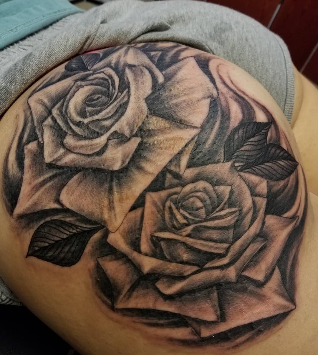 Roses realism tattoo on the shoulder by Anthony Coleman, Midland, Texas