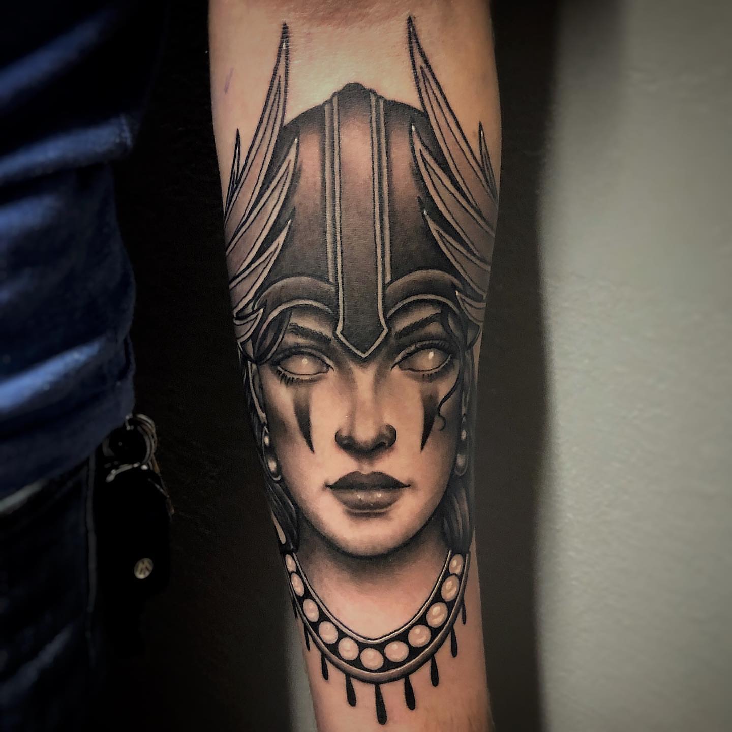 Woman with helmet realism tattoo on the forearm by Bill Johenning, Lakewood, Ohio