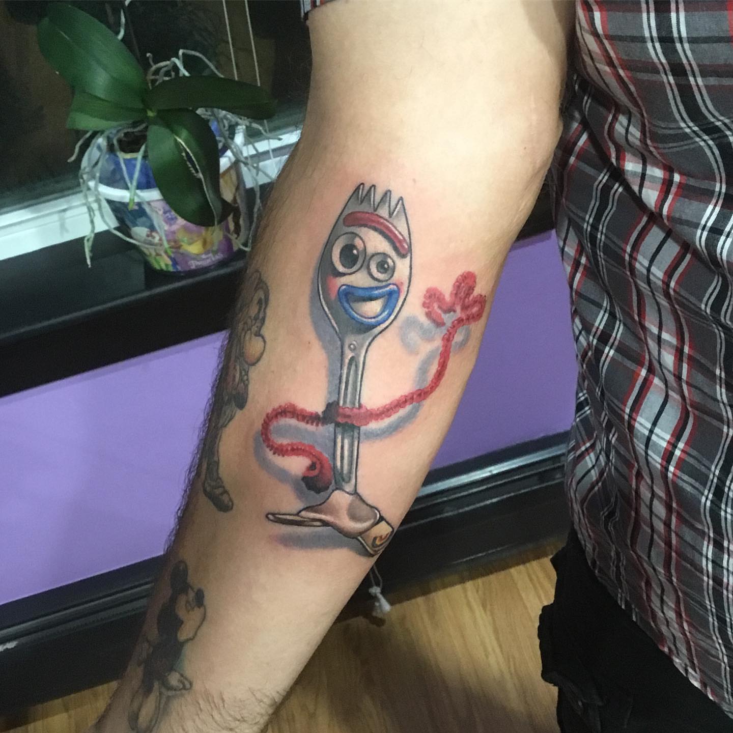 Forky realism tattoo on the forearm by Ariel Robinson