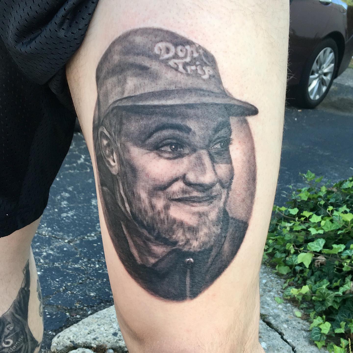 Portrait realism tattoo on the forearm by Comfy Chris Fettig