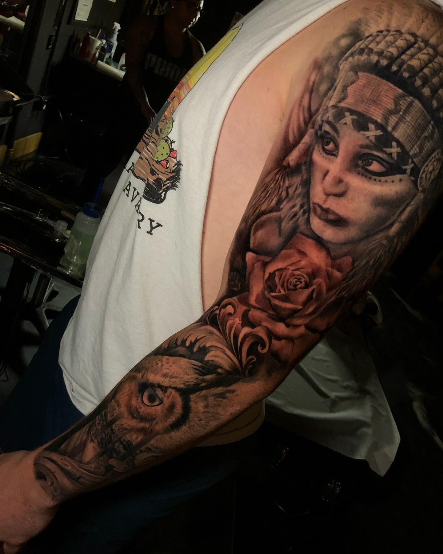 Woman with roses realism tattoo on the upper arm by Dalton King Pensacola Tattooer