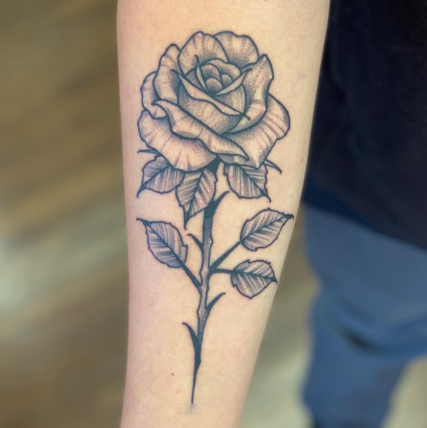 Rose black and grey tattoo on the forearm by Luis Torres, Harrison, New Jersey
