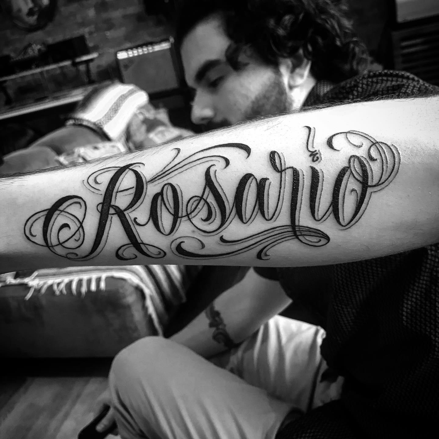 Rosario lettering script tattoo on the forearm by π π π β π π π π