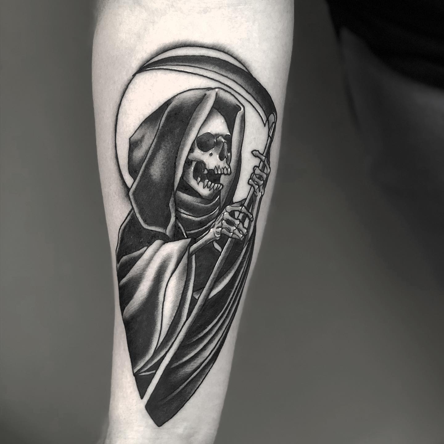 Grim reaper realism tattoo on the forearm by Sam Fortney, Columbus, Ohio