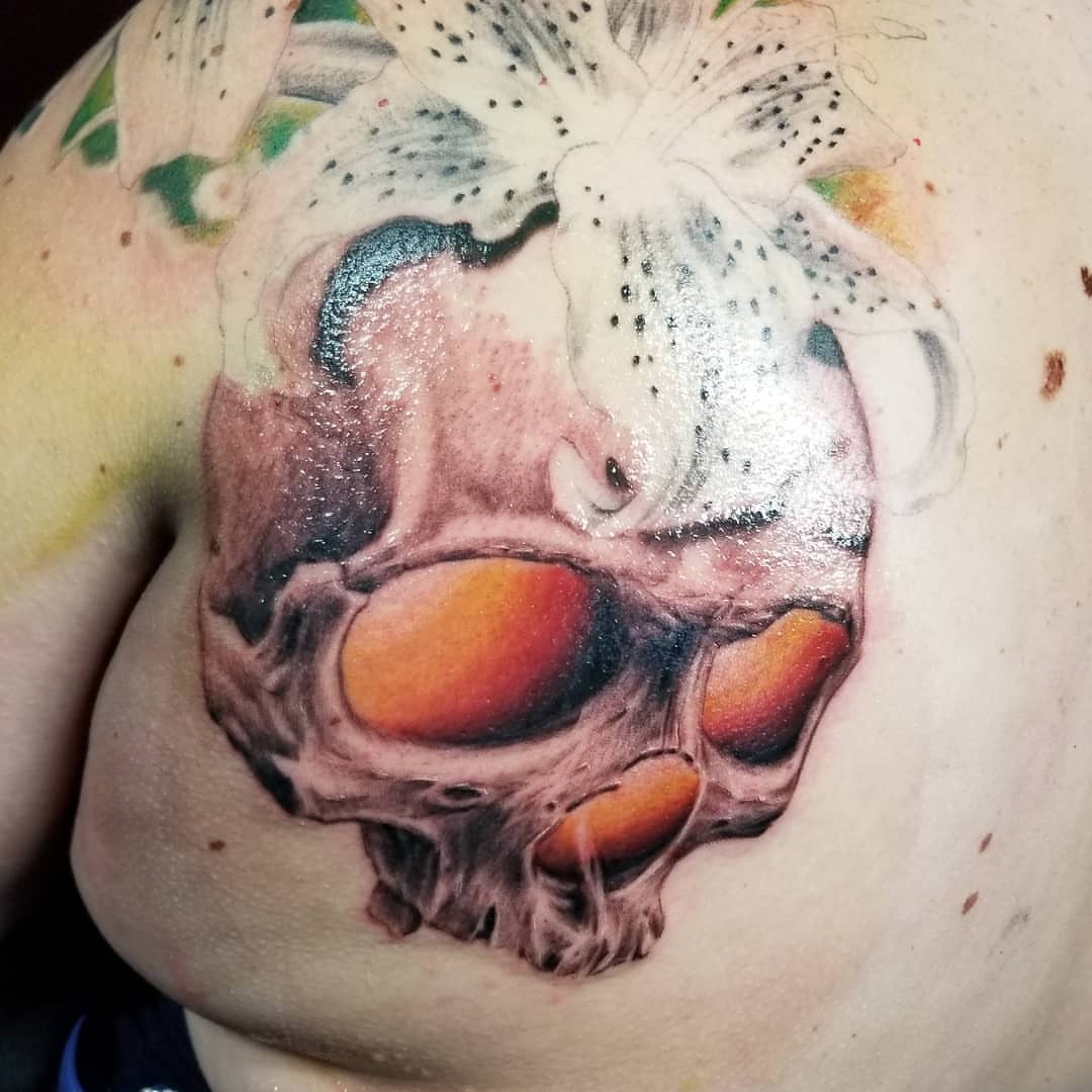 Flower realism tattoo on the chest by Jake Goss, Salt Lake City, Utah