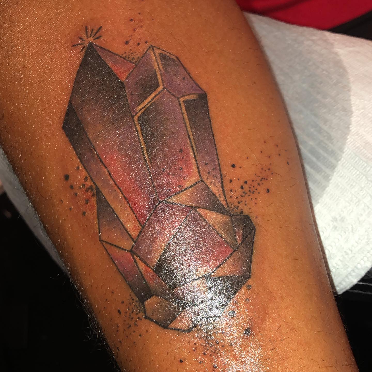 Geometric crystal geometric tattoo on the forearm by Dre Inks