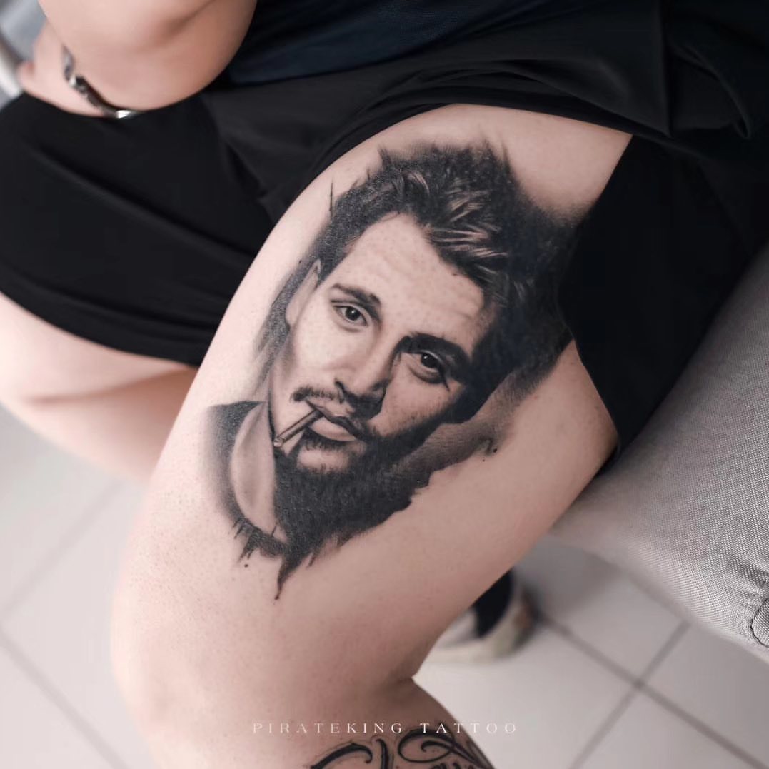 Portrait realism tattoo on the thigh by Duo