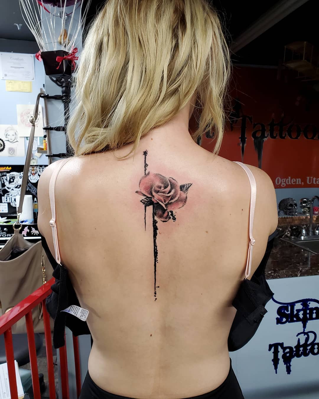 Rose realism tattoo on the back by Jack Daniel Knowlden