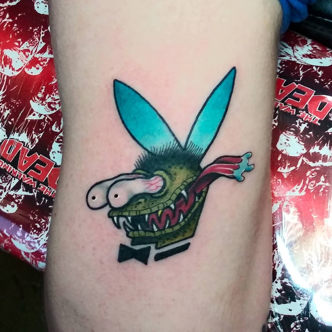 Monstrous rabbit character tattoo on the forearm by Dorrough Tattooer