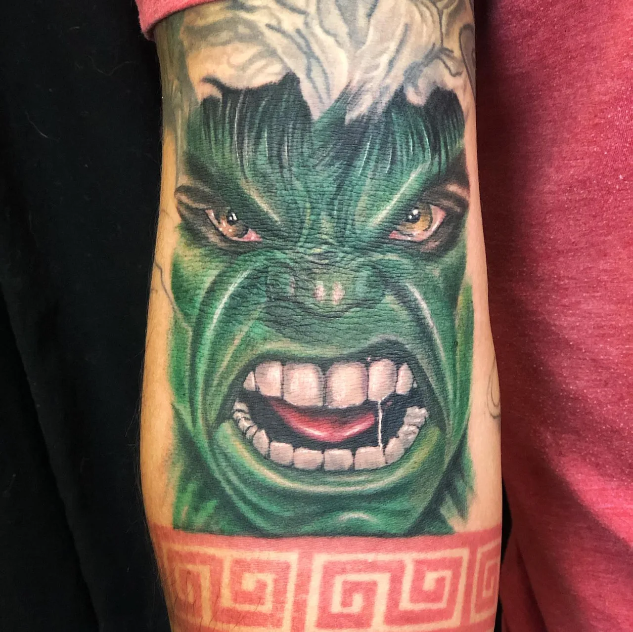 Angry hulk realism tattoo on the forearm by Charlie Soto