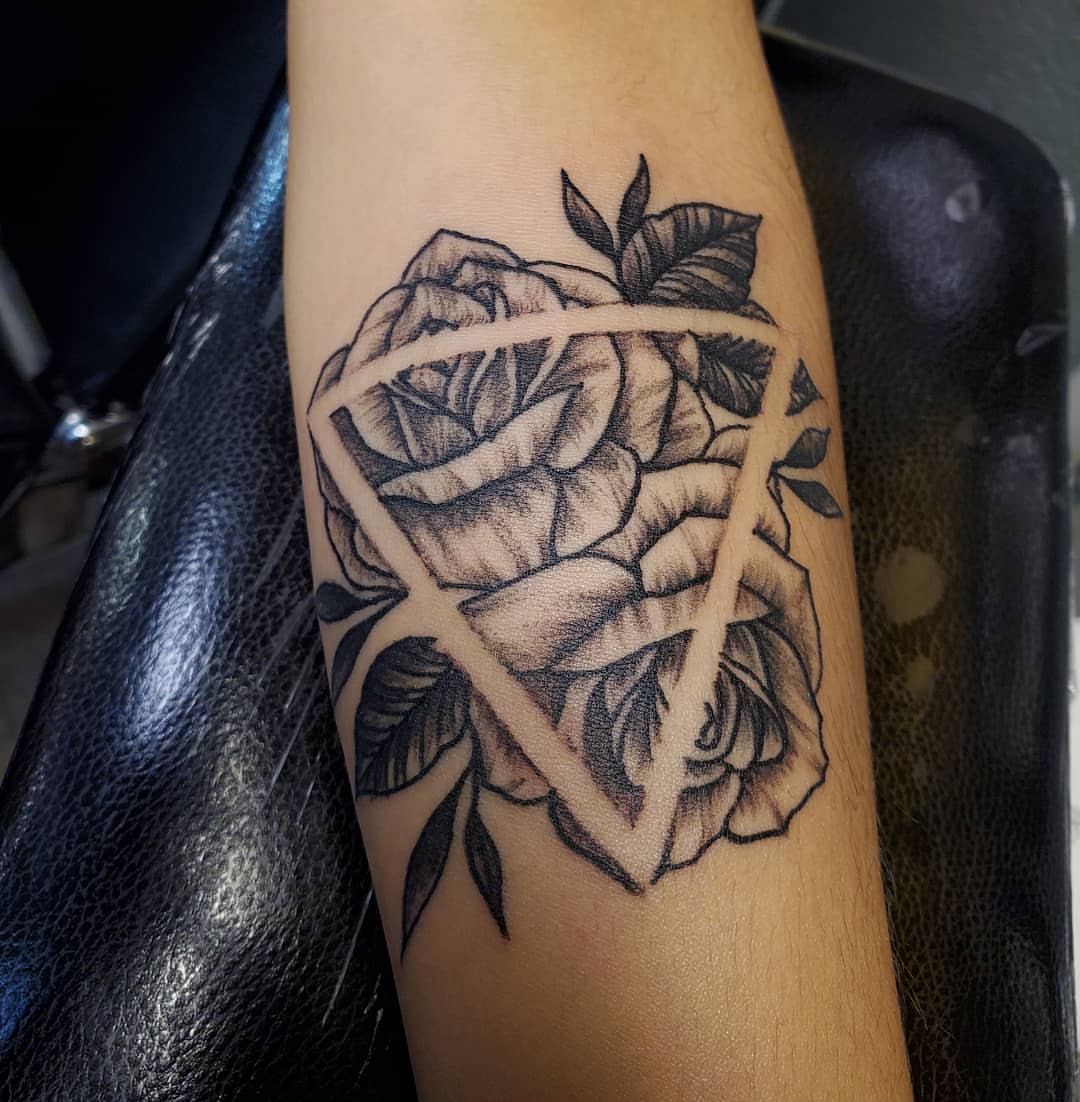 Rose black and grey tattoo on the forearm by Anthony Coleman, Midland, Texas